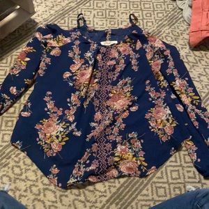 navy blue top with multi colored flowers on it